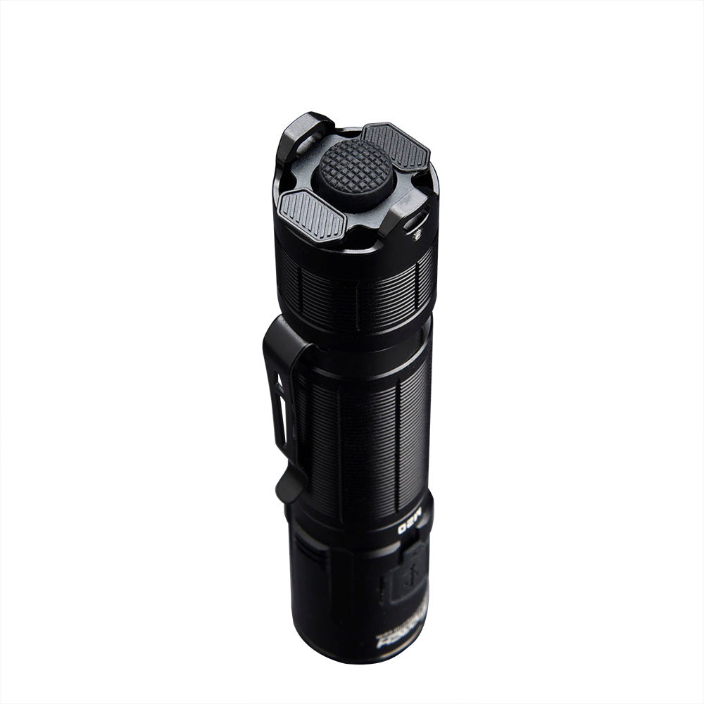 Fitorch M20 rear view showing the central tail switch and two function-switch paddles