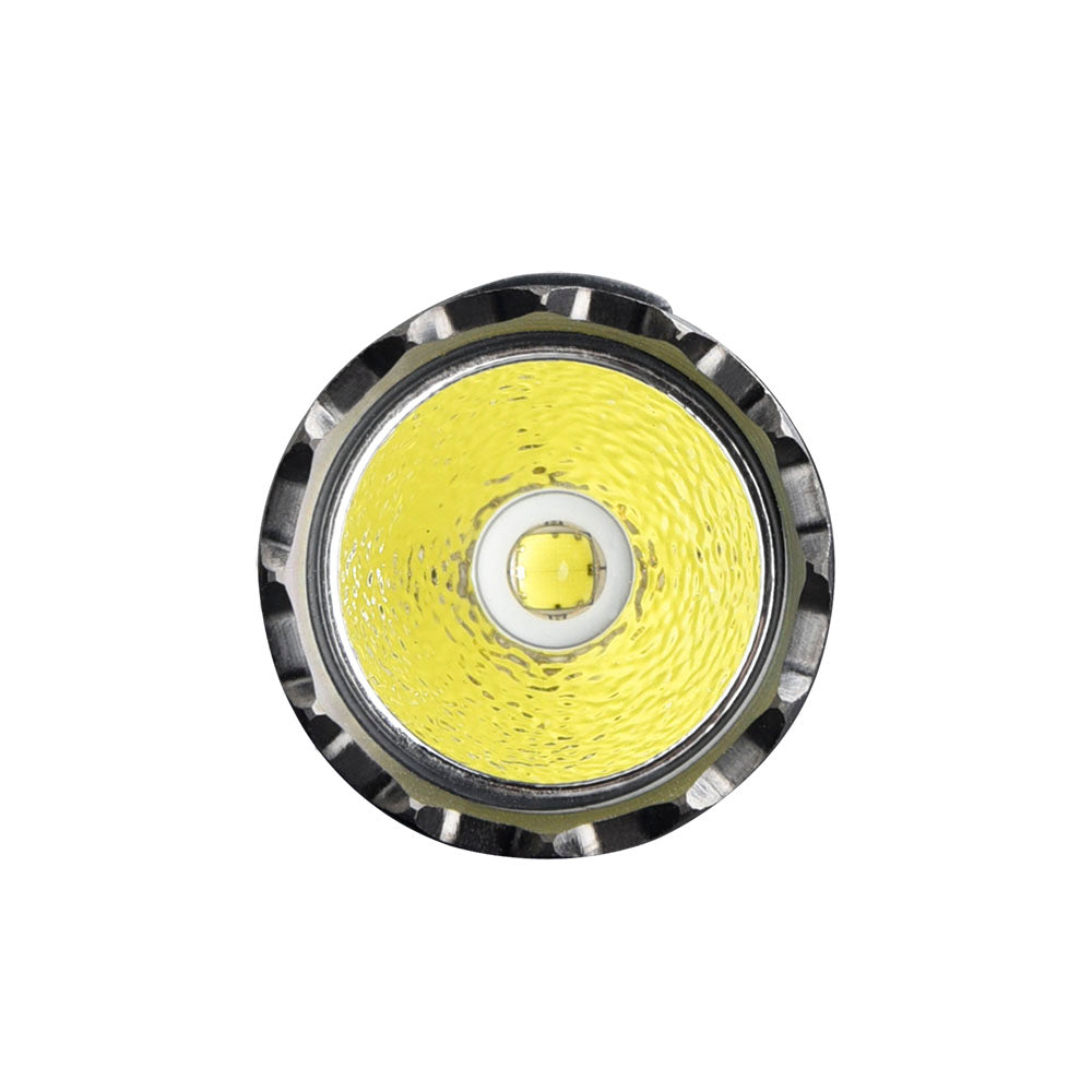Fitorch M20 front view of the LED, textured reflector and crenulated bezel