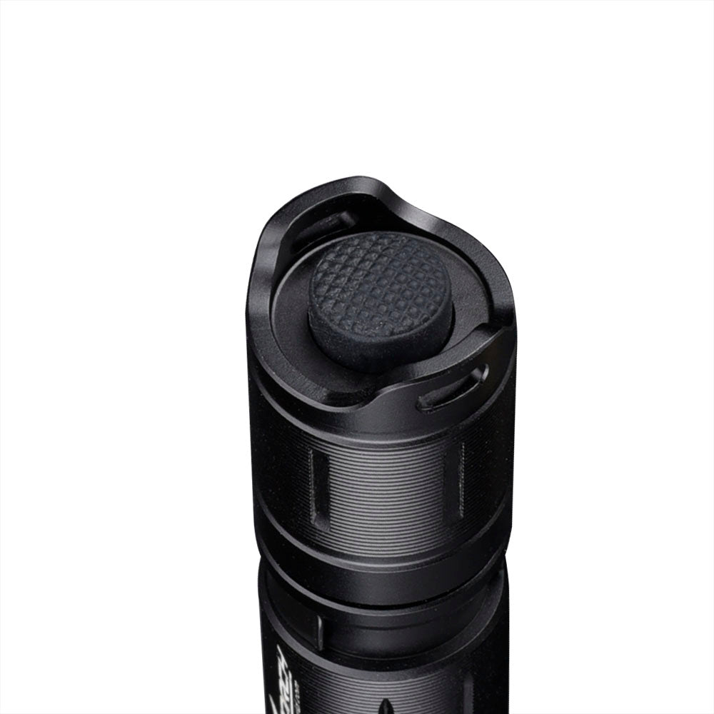 Fitorch P30C close-up of the textured tail-cap switch