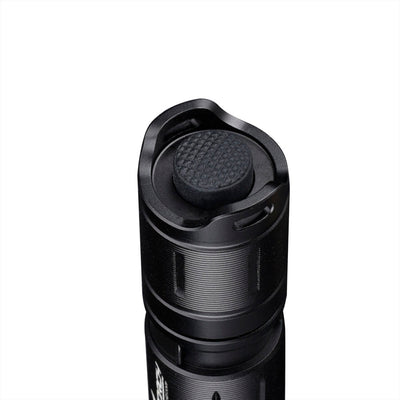 Fitorch P30C close-up of the textured tail-cap switch