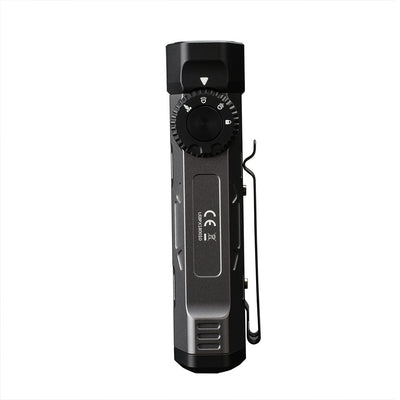 Fitorch PX18 dark flashlight showing its rotary mode dial and removable metal pocket clip