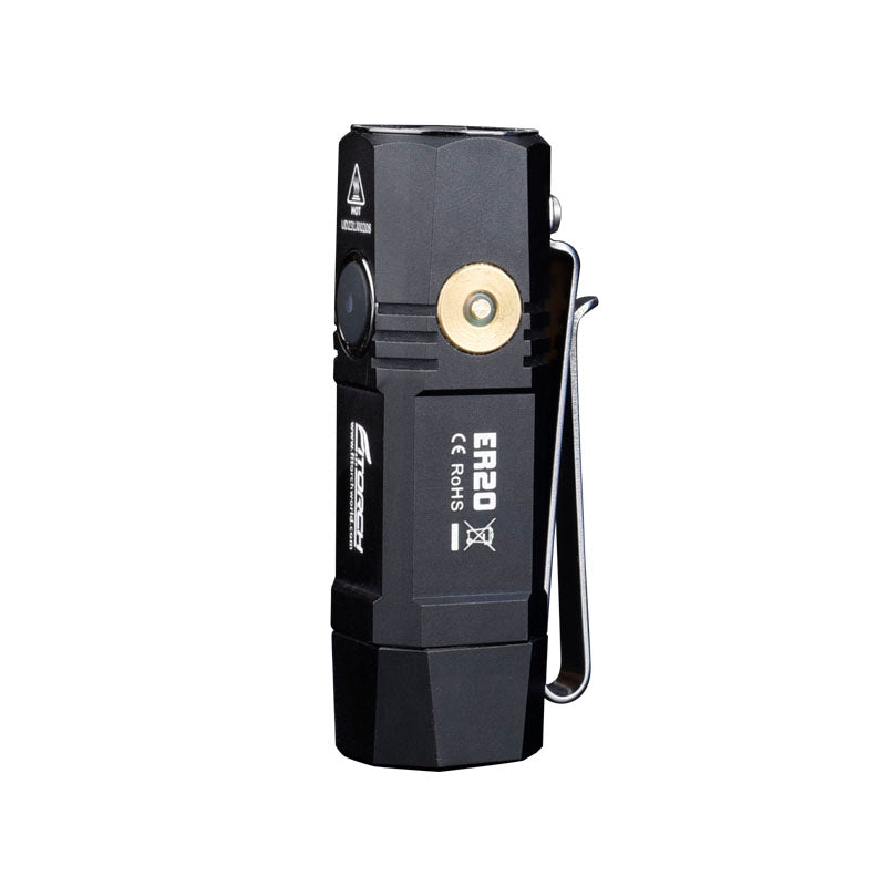 Fitorch ER20 black flashlight standing upright with its pocket clip and charging contact visible