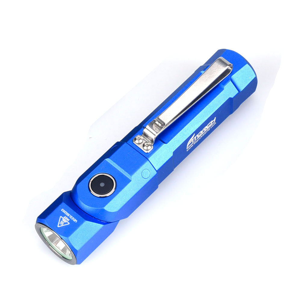 Fitorch ER26 blue flashlight angled to show its side switch and metal clip