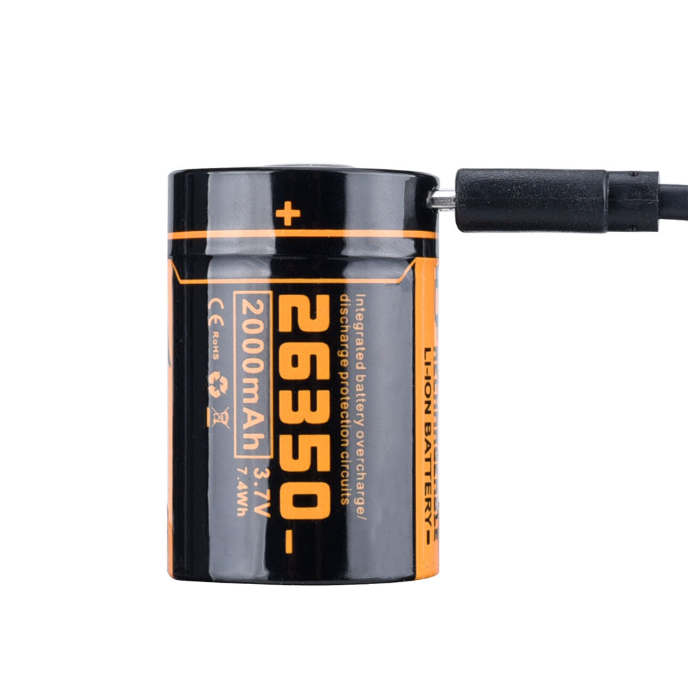 Fitorch P25 26350 battery labeled 2000mAh connected to a Micro-USB charging cable