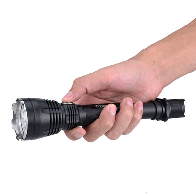 Fitorch PR40 long black flashlight held in one hand